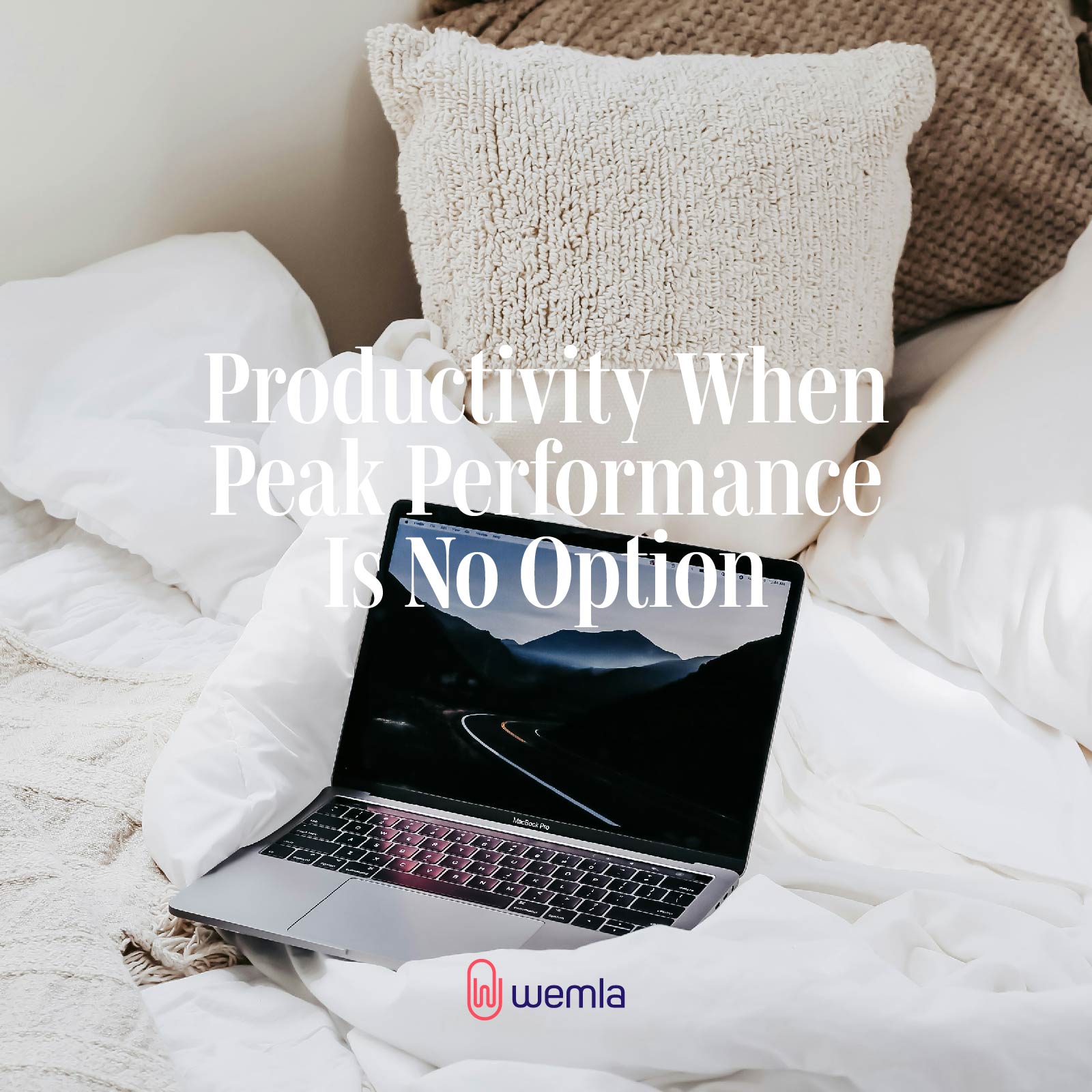 Laptop on bed with neutral bedding and text Productivity when peak performance is no option